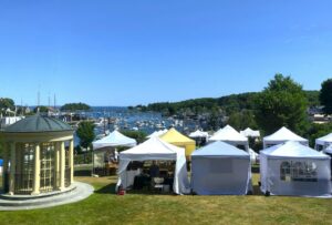 Vendor Tents on the park with ocean background